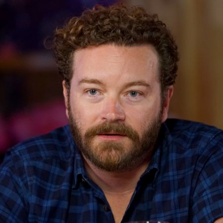 Danny Masterson in a blue shirt caught on the camera.